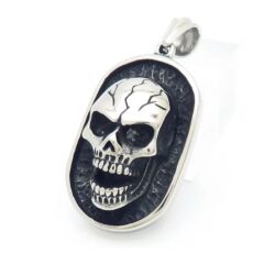 Disc Pendant with a Laughing Skull