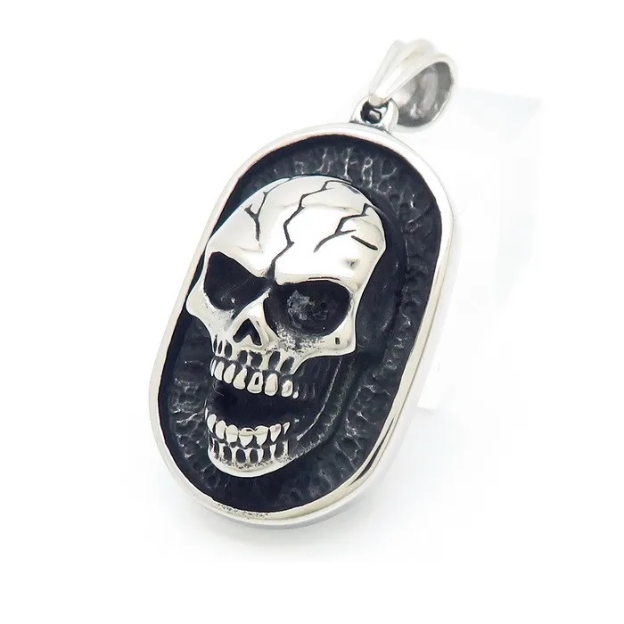 Disc Pendant with a Laughing Skull