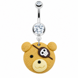 Silver belly bar with clear crystals and tan rubber pirate teddy bear dangle with skull eye patch